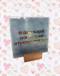 Tegeltje in deze wagen worden geen schoenen gedragen