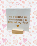 Tegeltje wat er ook komen gaat